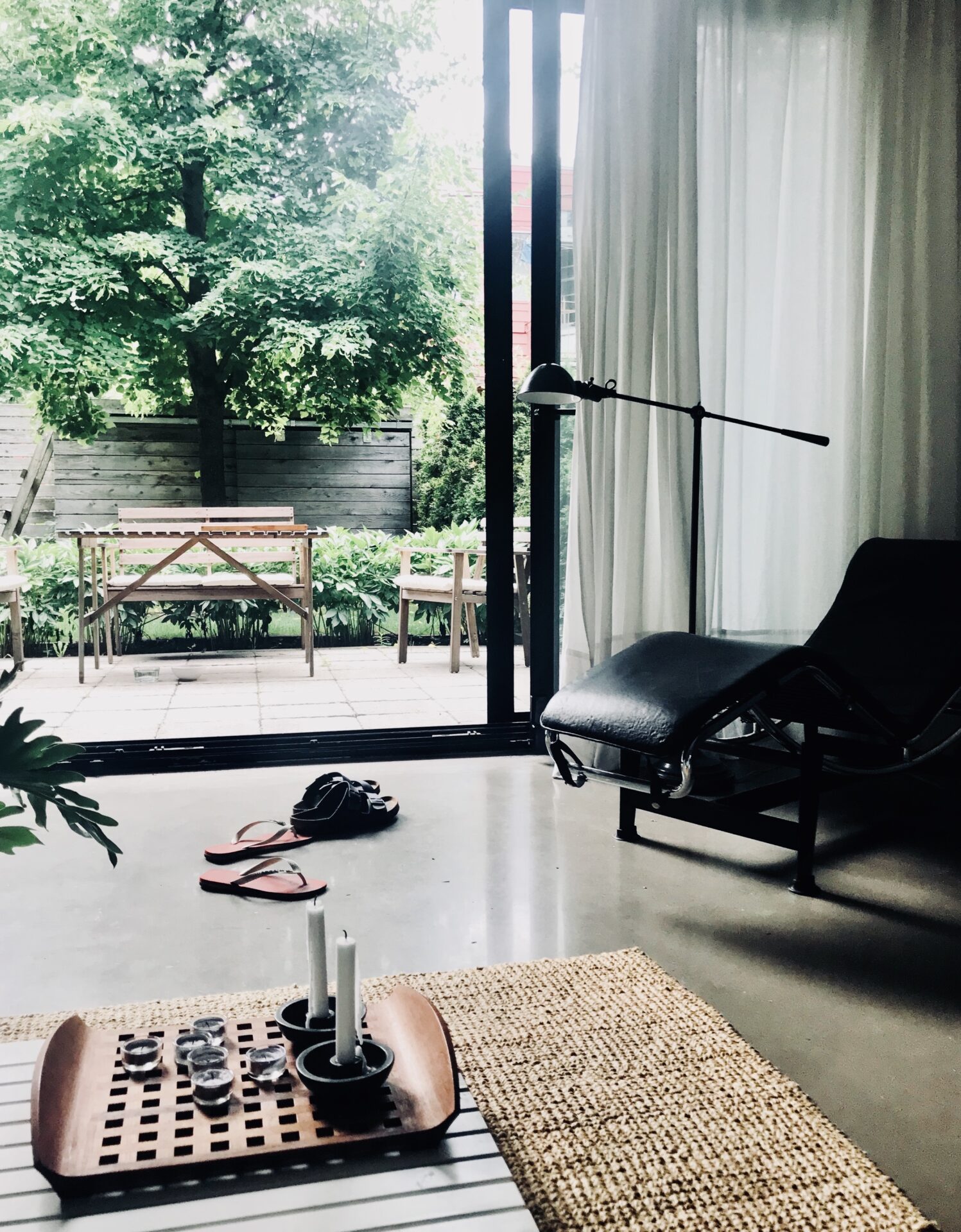 interior-of-a-living-room-with-modern-furnishing-t-2022-11-02-03-44-41-utc male-real-estate-agent-doing-business-showing-house-potential-buying-couple