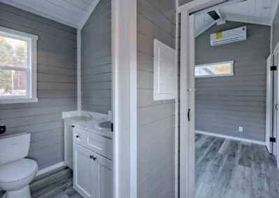 Partial view of a Savanna model home bathroom and the attached area.