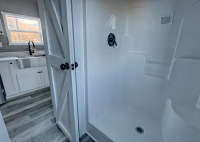 Partial view of a Savanna model home bathroom and the attached area.